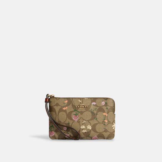 Get A Chic And Practical Look With Signature Canvas Wildflower Wristlet