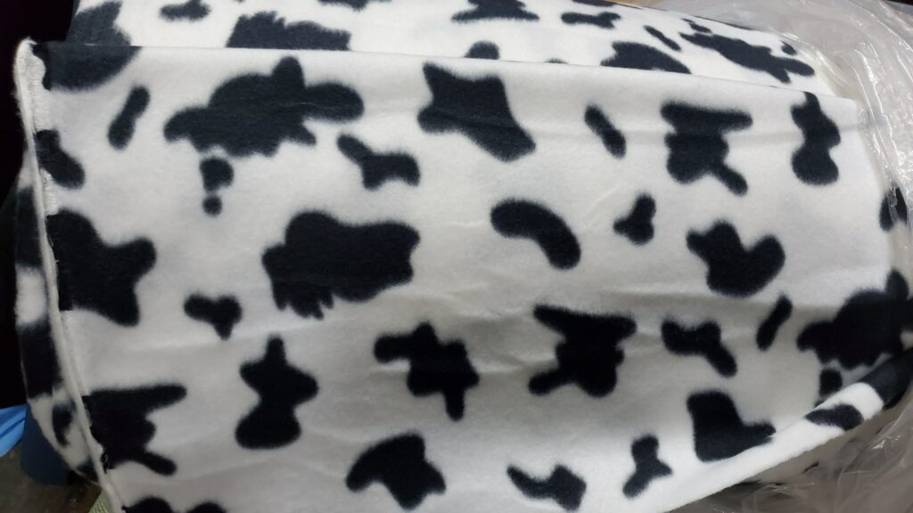 Get Trendy With Our Fleece Fabric Cow Print Collection