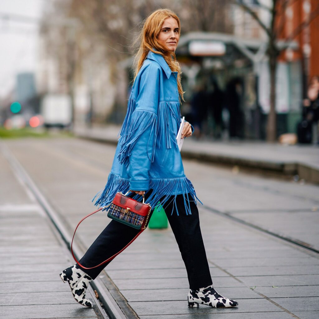 Step Out In Style With Trendy Cow Print Clogs