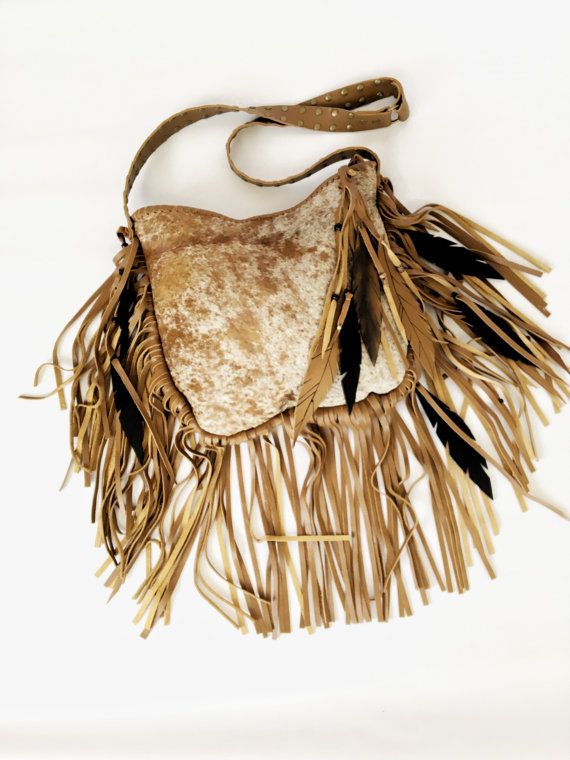 Stylishly Bold Cow Print Fringe Purse For Fashion Forward Individuals